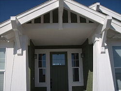 Knee braces, tapered posts and heavy fascia boards, craftsman
